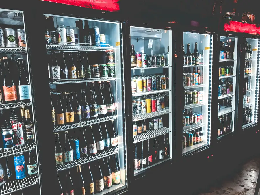 Refrigeration unit filled with bottles and cans