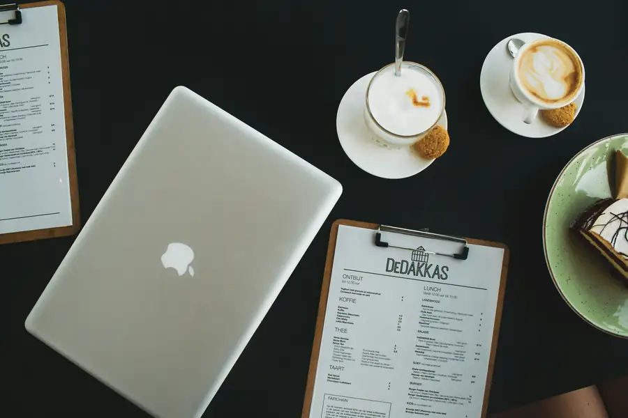 Restaurant financing documents and laptop