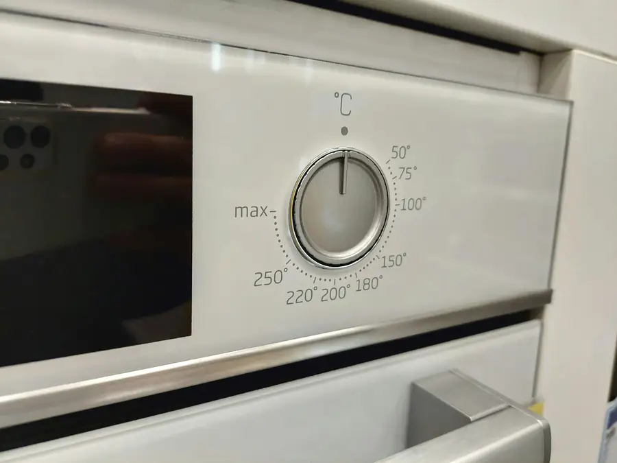 A combi oven being maintained and cleaned