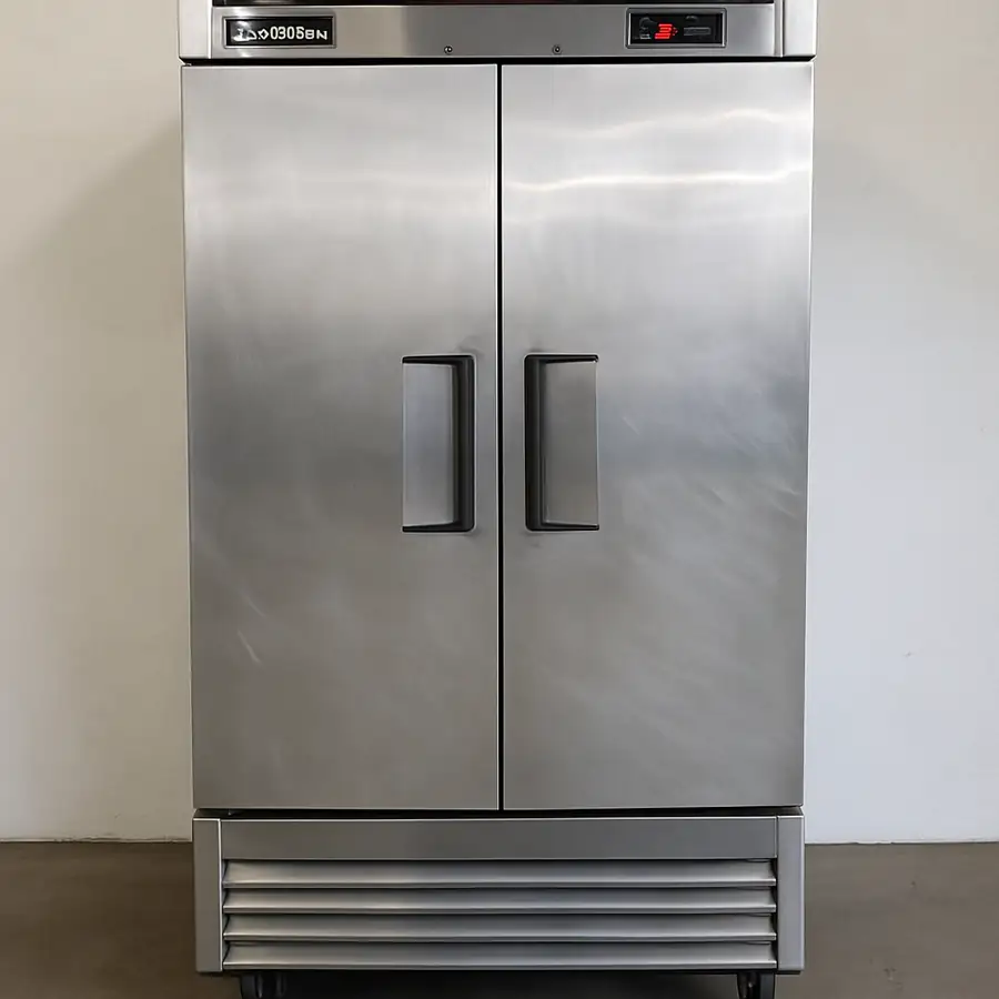 A tall, two-door stainless steel commercial refrigerator from True Refrigeration, emphasizing its solid build and external temperature display
