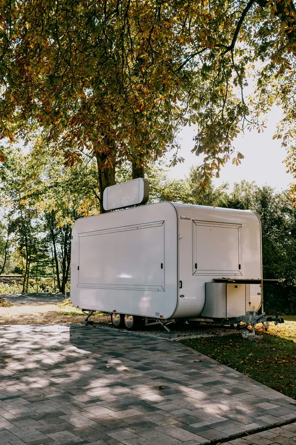 Generator powering beverage trailer equipment outdoors