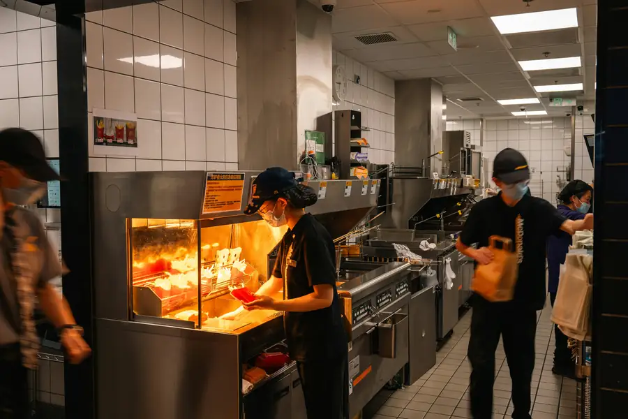 Image of a commercial kitchen with various fryers