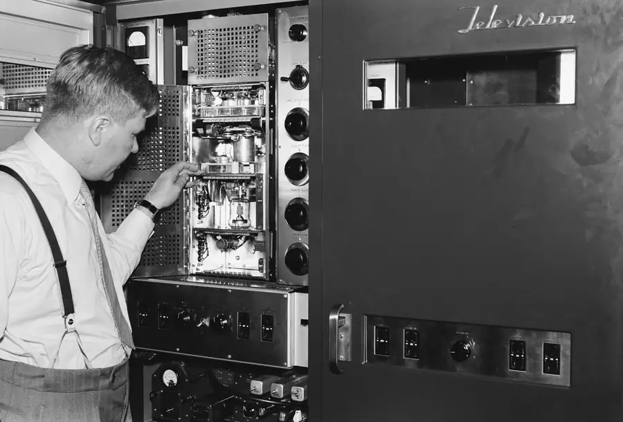 An operator reviewing the combi oven control panel