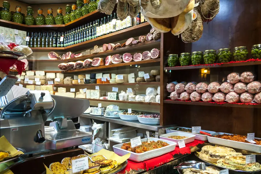 Various foods sliced by a commercial meat slicer