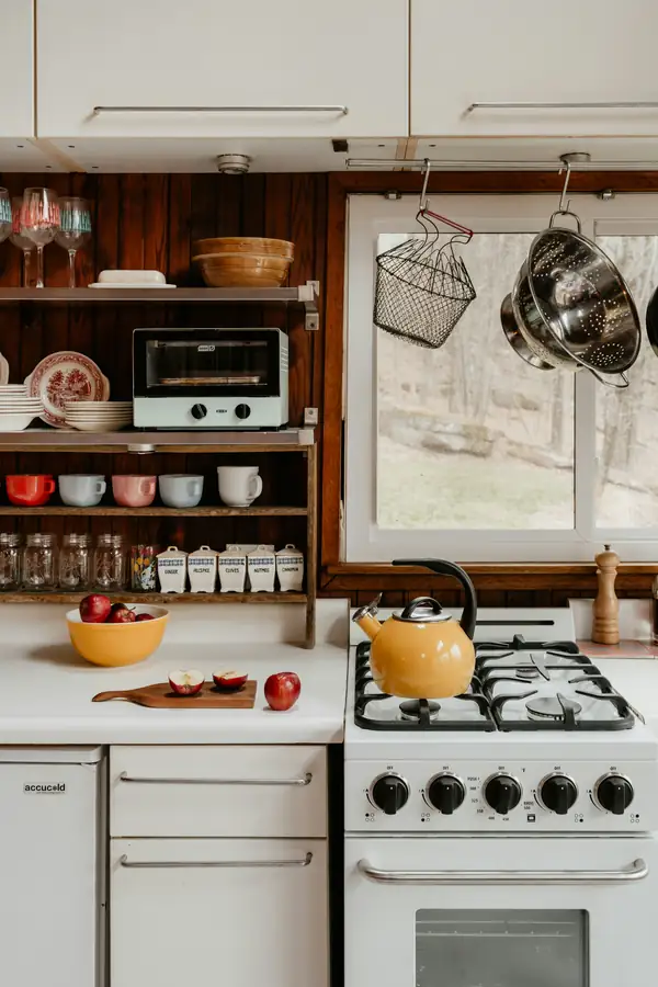 Image of kitchen supplies including an oven, blender, and toaster