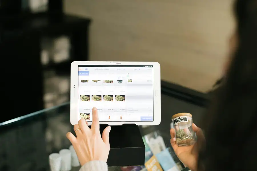 Bar employee using a POS system