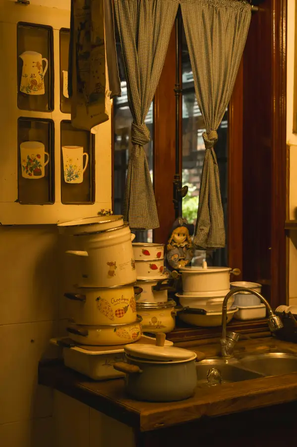 Various food processor attachments laid out on a kitchen counter