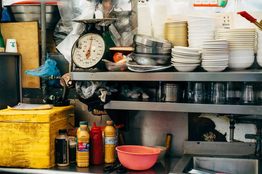 Image of a food lorry being equipped with kitchen tools and appliances