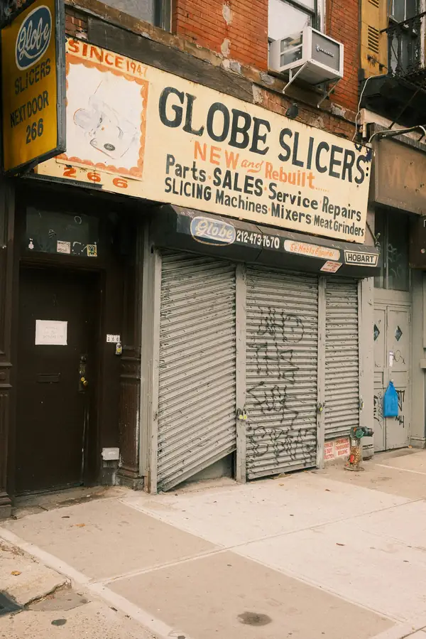 A Globe commercial meat slicer showcasing its versatility