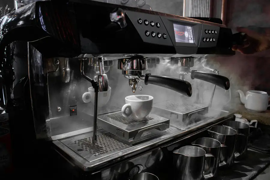 Cleaning a commercial coffee machine