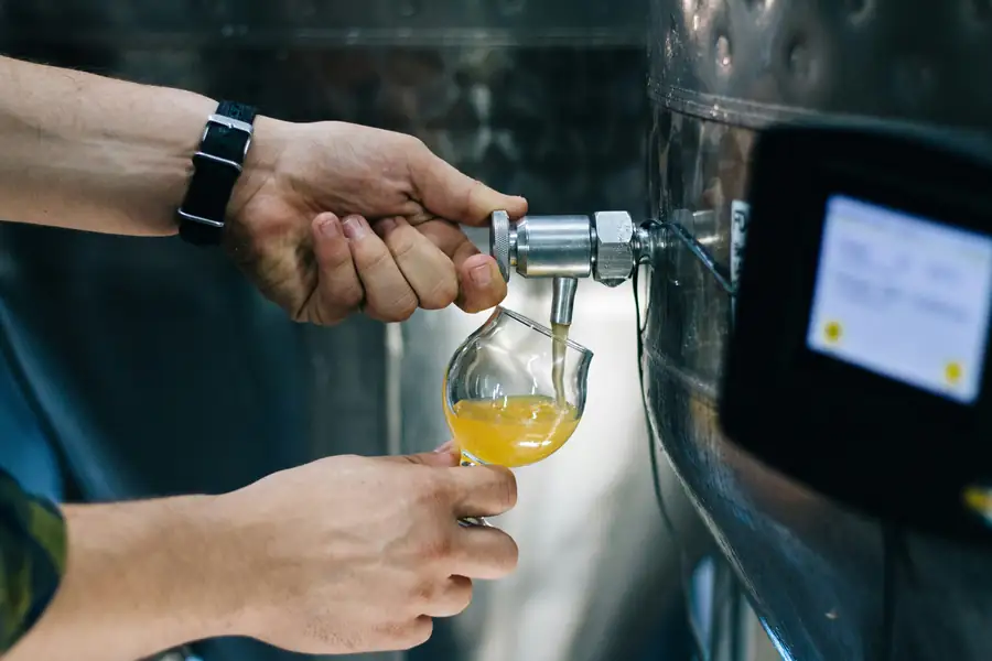 Beverage dispensers and taps in action during a busy service