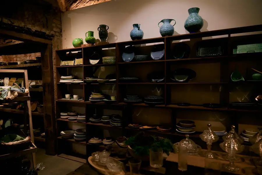 A variety of glassware neatly arranged on shelves