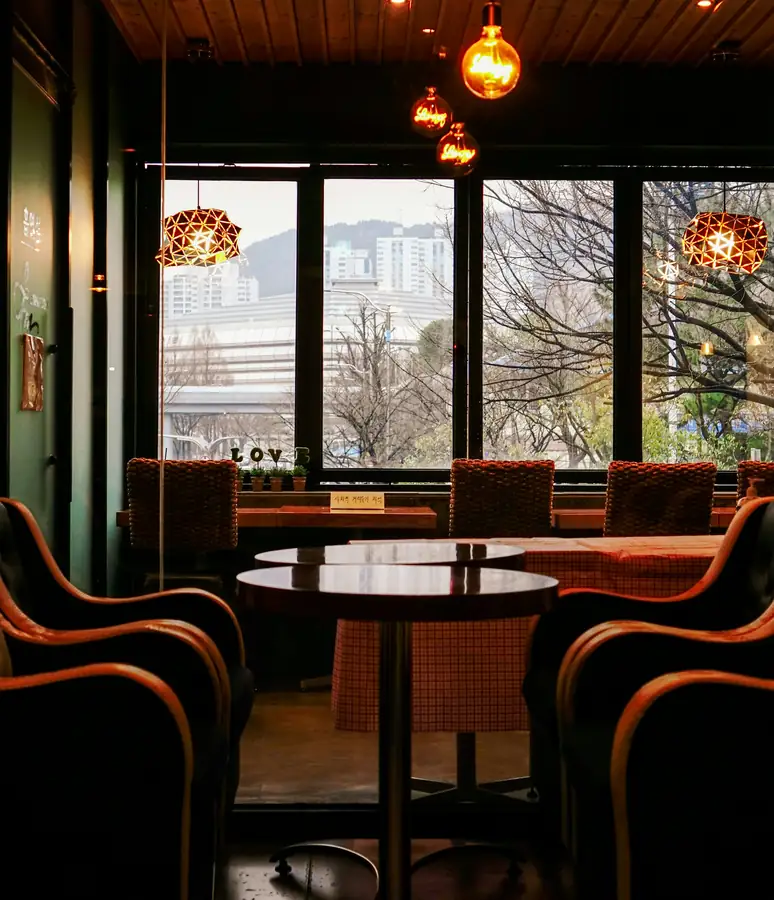Cafe with comfortable seating and ambient lighting