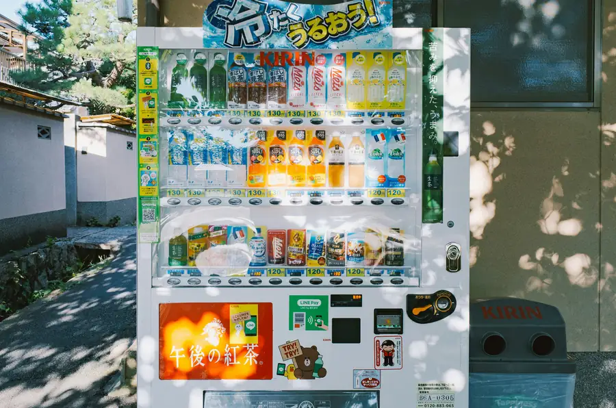 Upright merchandiser refrigerator displaying beverages