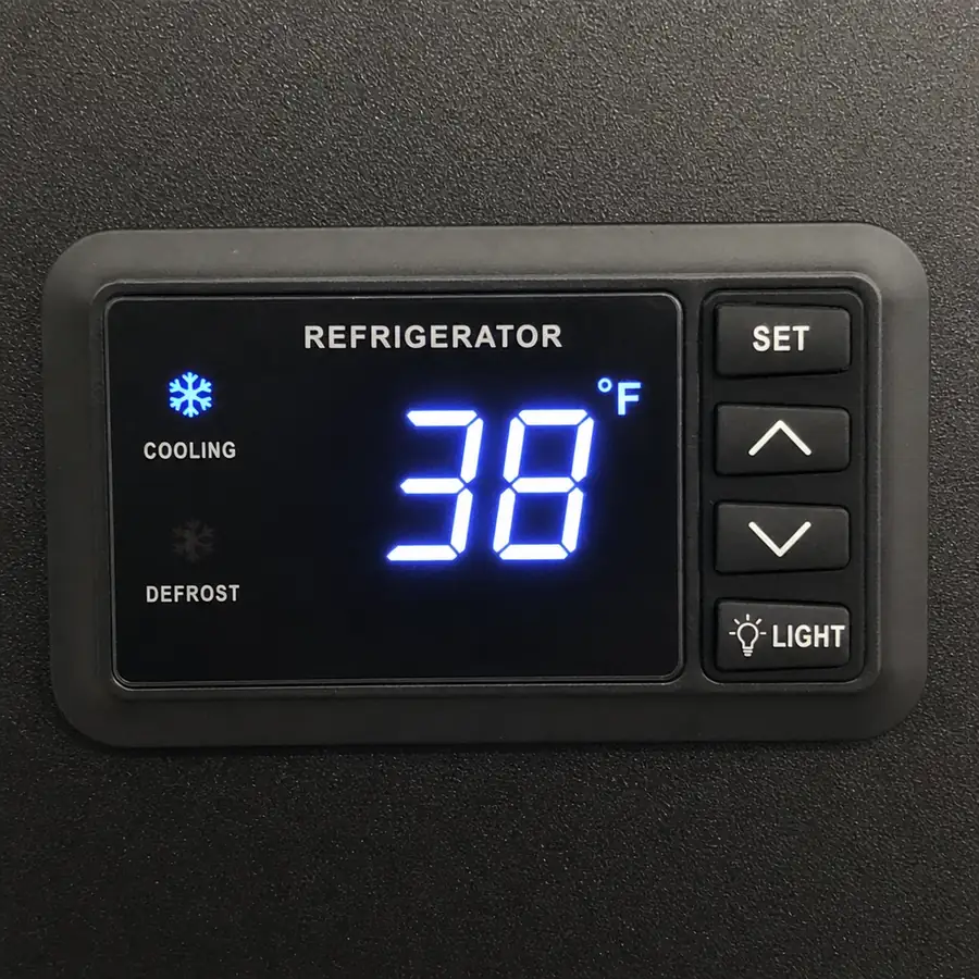 Close up of commercial refrigerator digital temperature control panel in English