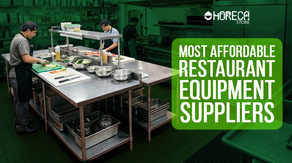 Commercial kitchen staff preparing food at stainless steel prep table with restaurant equipment