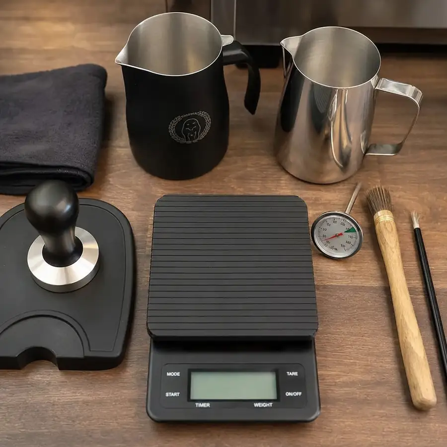 Cafe bar setup with espresso machine and barista equipment essentials