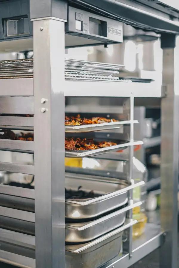 Essential commercial kitchen equipment including cooking refrigeration and prep stations