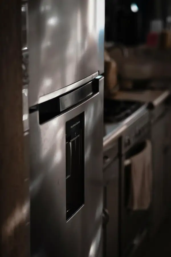 Commercial fridge keeping perishable food and beverages fresh in a kitchen