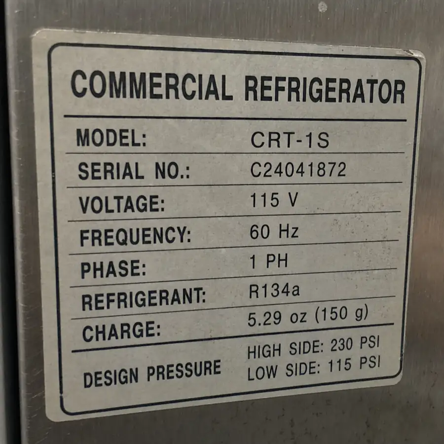 Inspecting used commercial fridge door seals, coils, and cooling performance before purchase