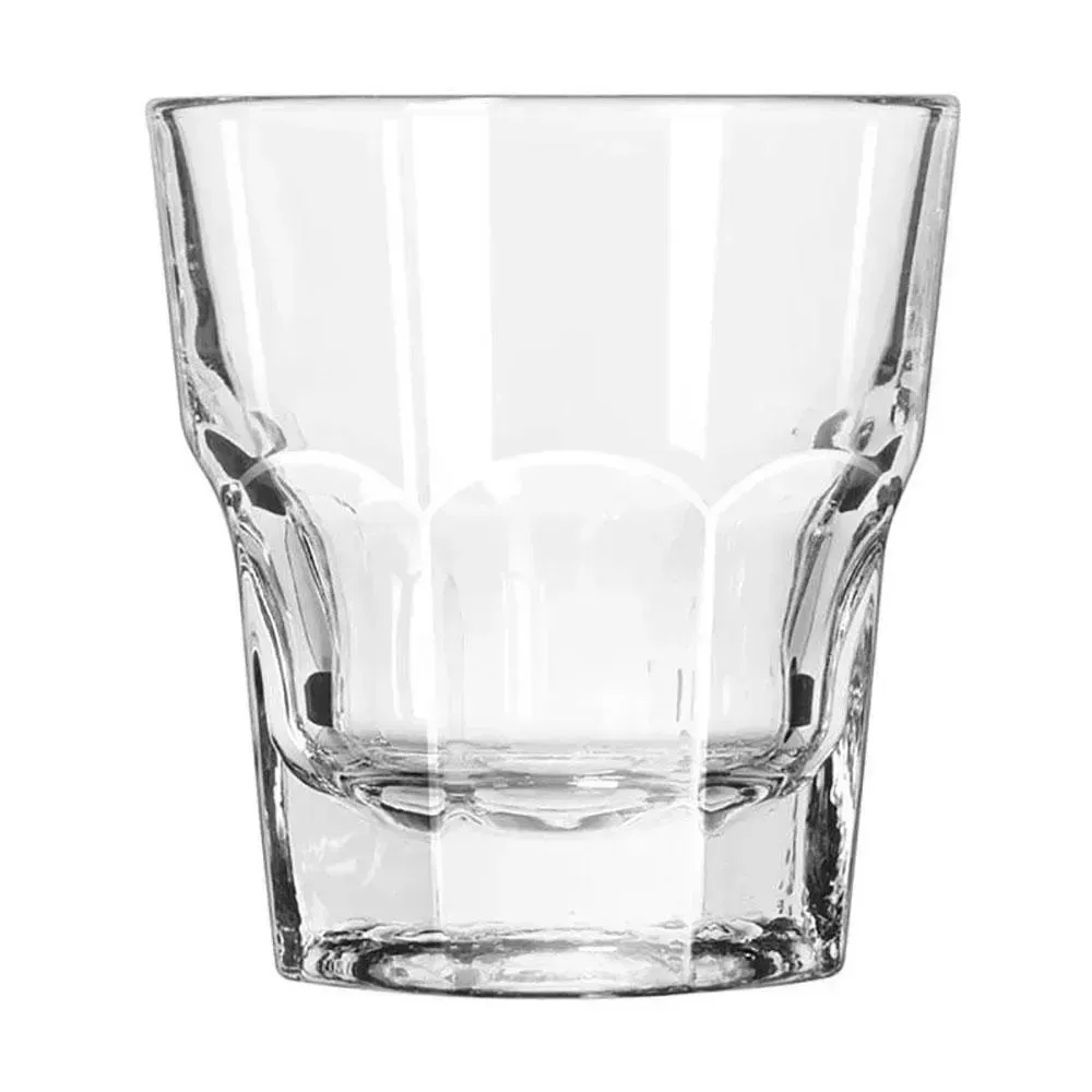 Elongated Gibraltar tall rocks glass from Libbey with an elegant shape, perfect for sophisticated cocktail service or signature old fashioneds.