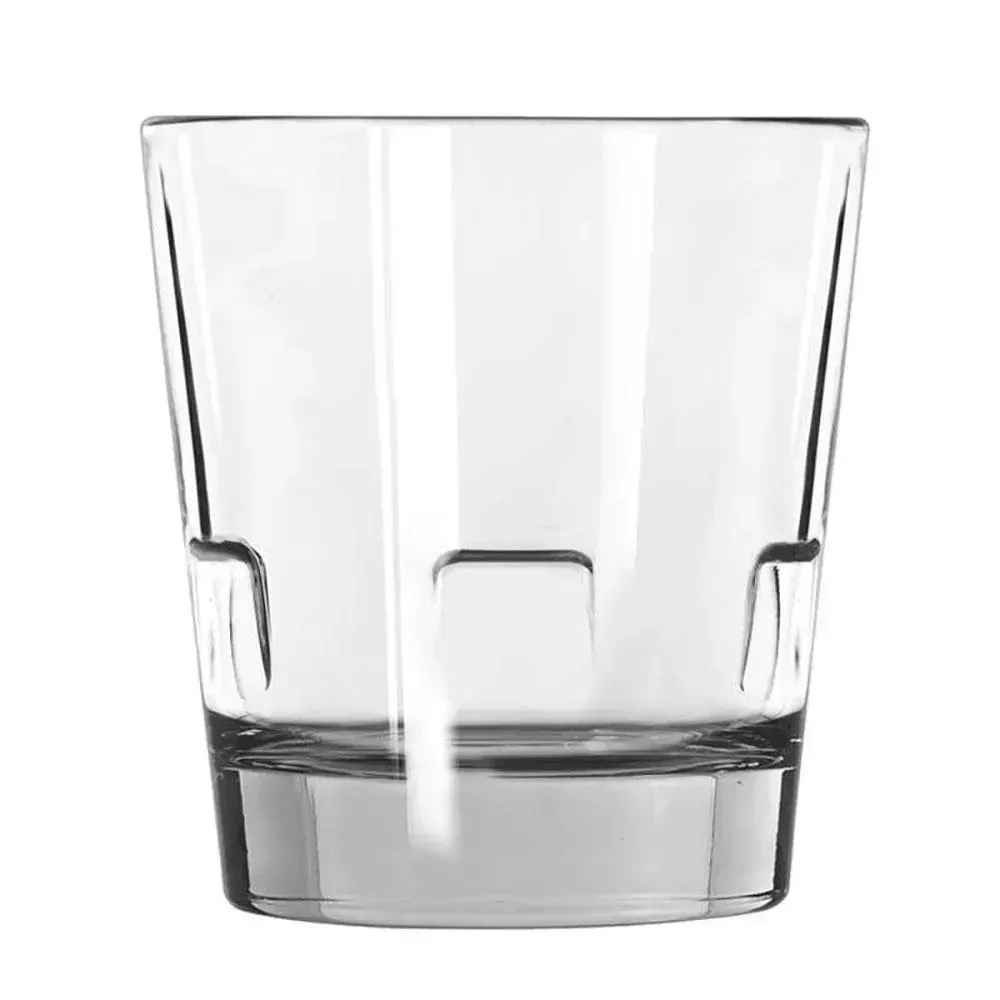 Elegant Optiva customizable stackable rocks glass by Libbey, designed for cocktails or spirits, perfect for a bar, lounge, or table use.