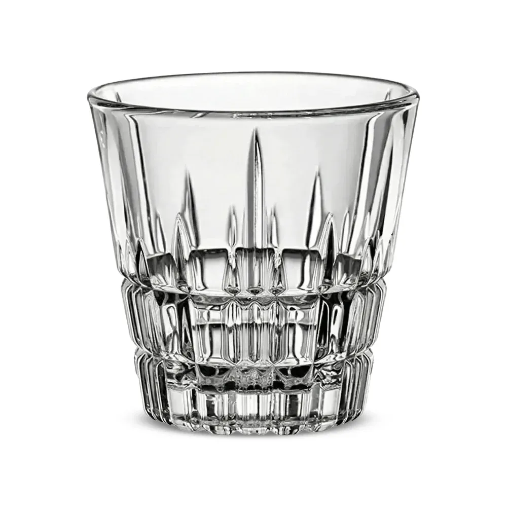 Espresso shot glass from Libbey with rich crema beside biscotti and a vintage spoon on a slate board, perfect for café or brunch photography.