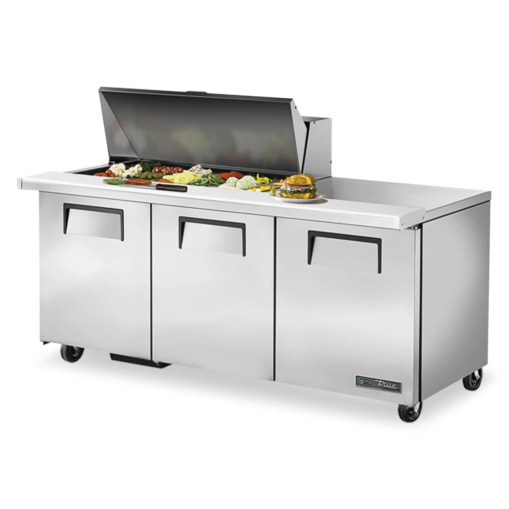 True mega top sandwich prep table with three-door base provides ample cold storage for fresh ingredients in commercial kitchens.