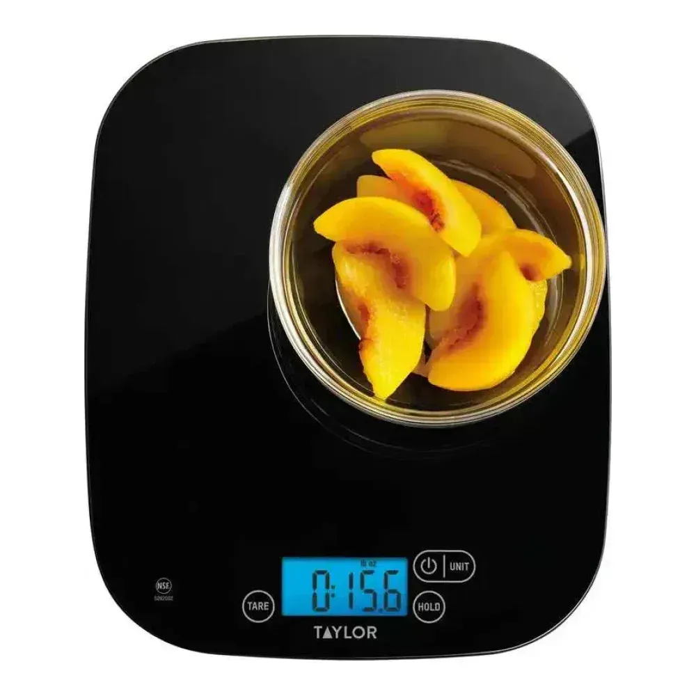 Taylor waterproof glass digital portion scale, hygienic and high-capacity for accurate measurements in wet or messy commercial kitchen environments.