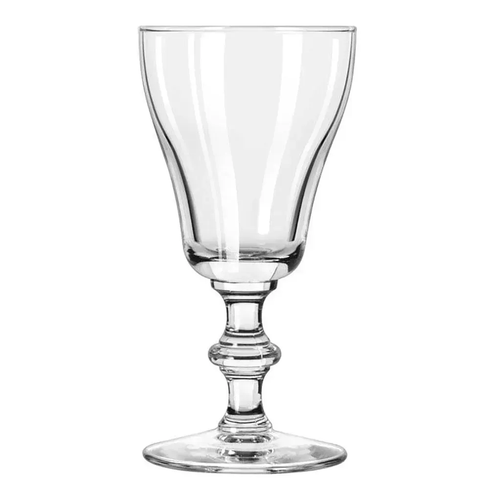 Footed Irish coffee glass from Libbey with a handle, perfect for hot beverages in hotel cafés or restaurant service with an elegant presentation.