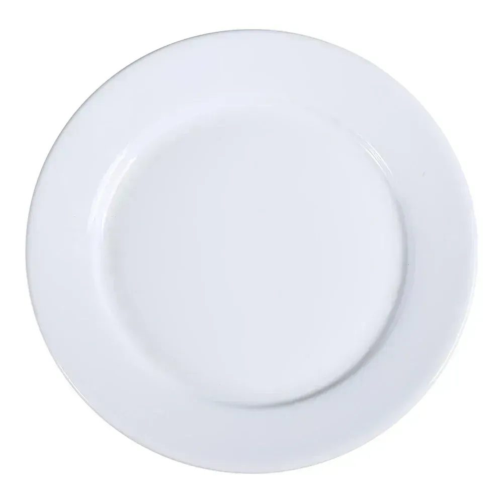 Bright white chinaware dinner plate from Yanco China on linen with seared steak and seasonal sides, highlighting coupe rim and modern dining appeal.