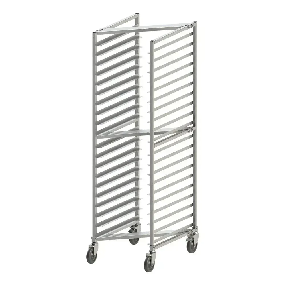 Twenty tier aluminum pan rack by Winco near a window holds cookie trays lit by natural light, perfect for cooling and bakery efficiency.