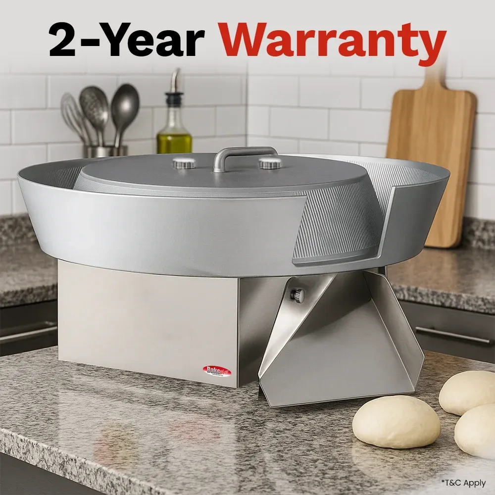 BakeMax Titan Series countertop dough ball rounder with stainless steel housing, safety guard, and adjustable settings for dough portion rounding.