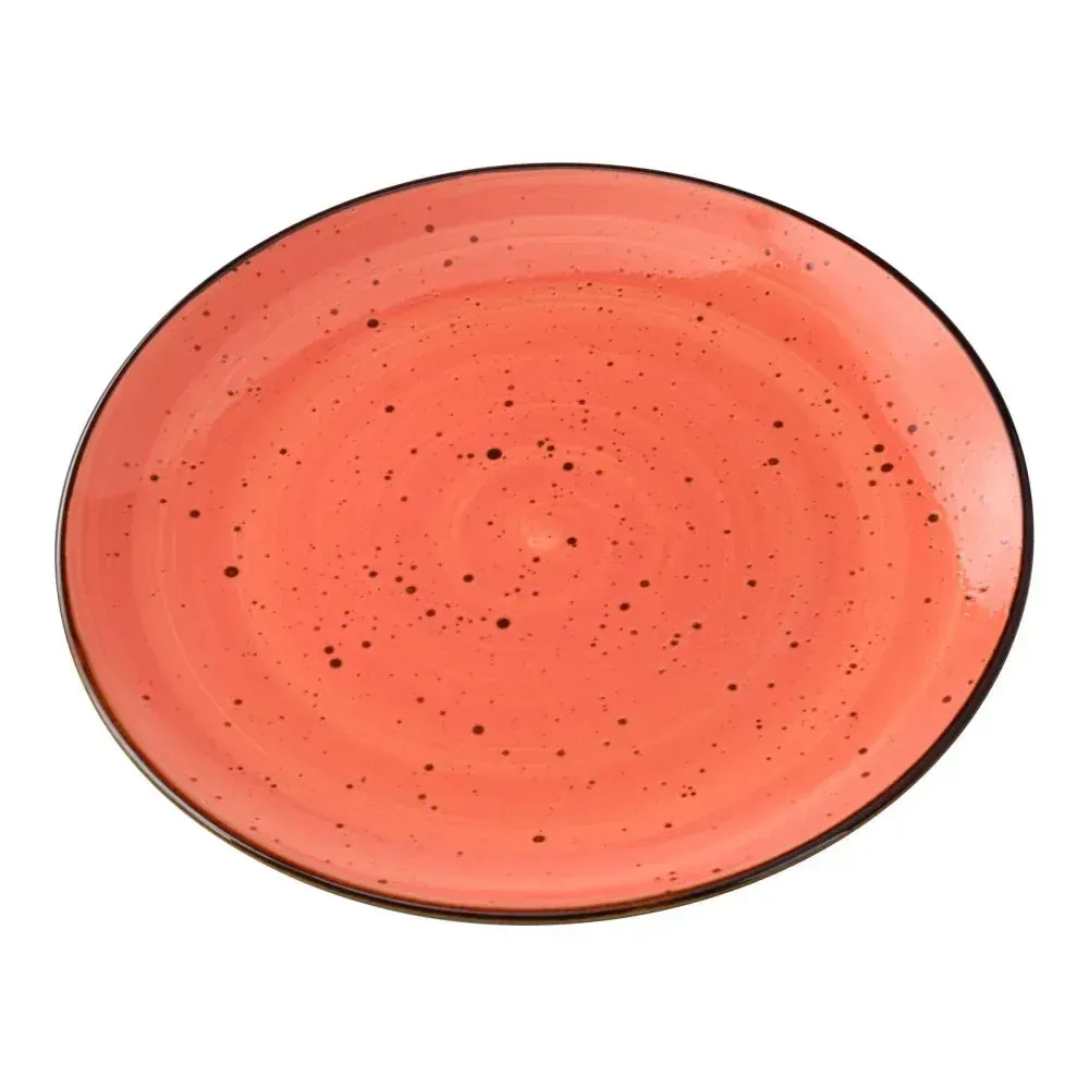 Large round coupe plate with swirled reactive coral glaze by Yanco China, offering a handcrafted backdrop for signature entrees.