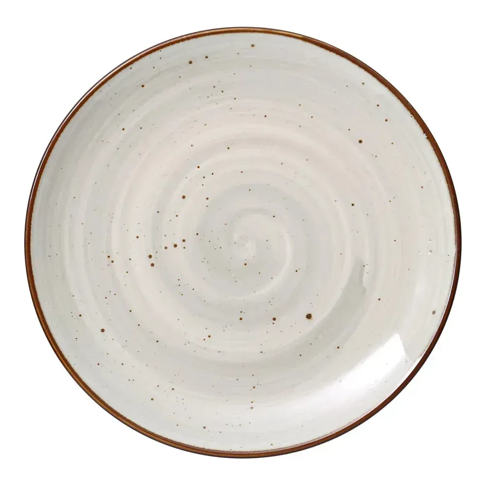 Large round coupe plate from Yanco China with a swirled, reactive glaze, providing a rustic, handcrafted backdrop for signature main entrees.