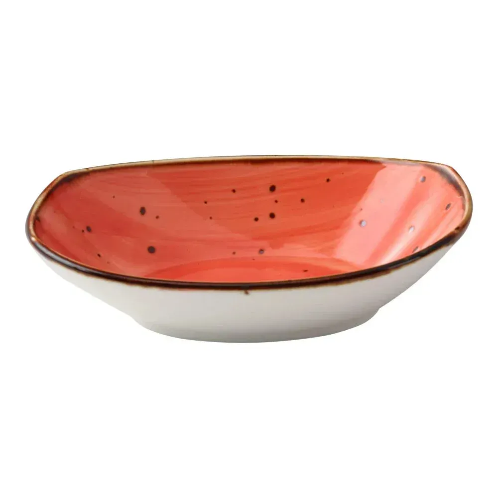 Medium ten ounce reactive glaze coral oval pasta bowl from Yanco China, ideal for individual pasta or salad servings with warmth.
