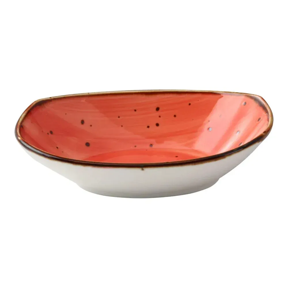 Wide twenty ounce reactive glaze coral oval salad bowl by Yanco China, perfect for generous salad servings with handcrafted style.