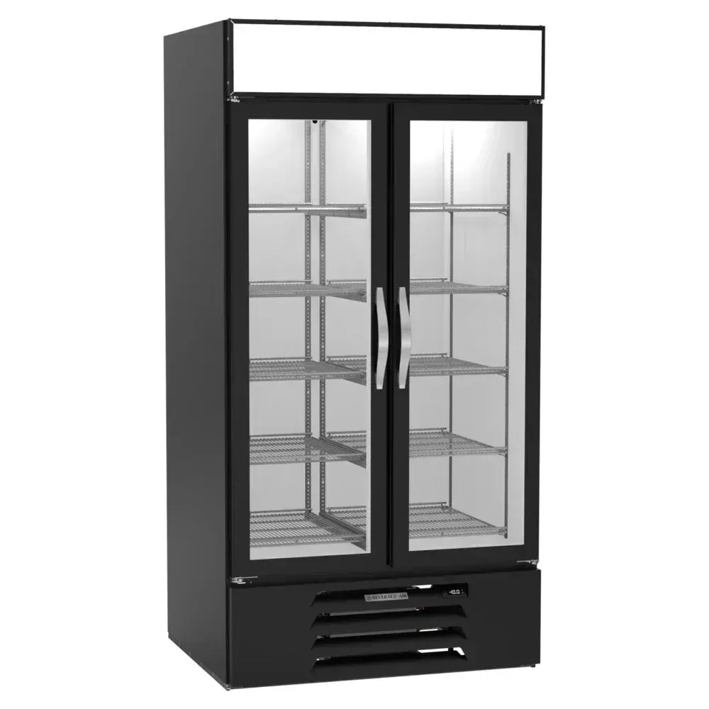 Beverage-Air curved lid novelty freezer with bright LED lighting, ultra-compact for tight retail spaces showcasing frozen desserts.