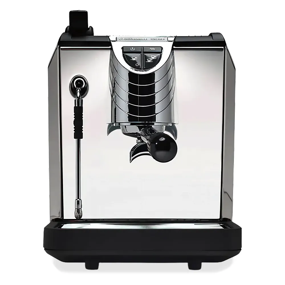 Nuova Simonelli direct-connect espresso machine in glossy black with stainless accents placed on a sleek café counter in a modern coffee setup.