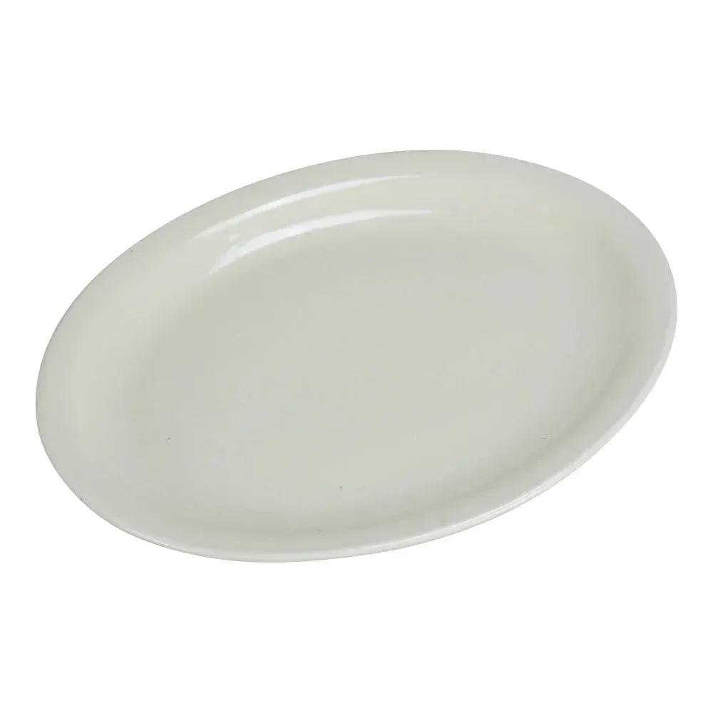 Small oval chinaware platter with a narrow rim from Yanco China, its elongated shape ideal for serving individual fish dishes or pastries.