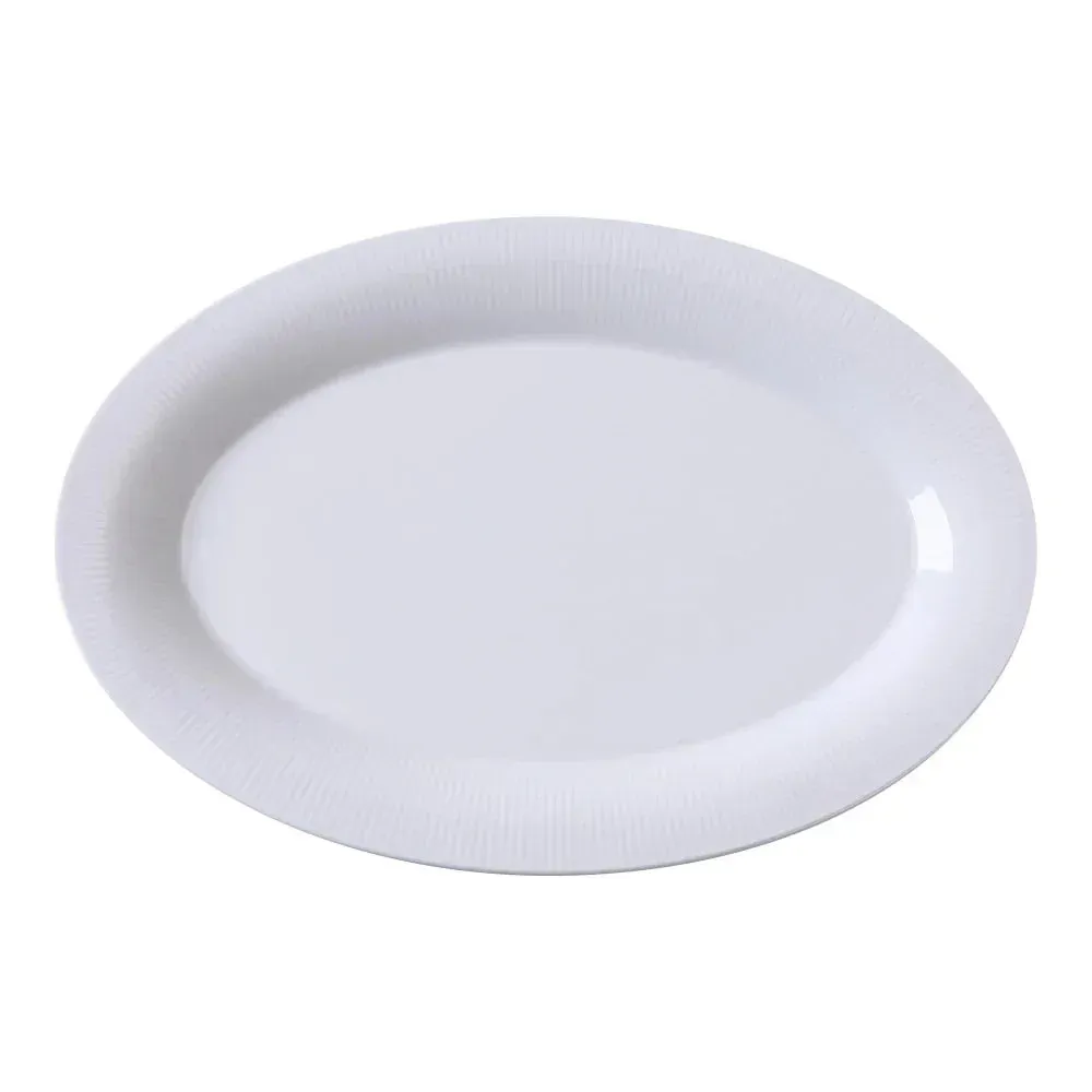 Yanco China graceful white dinner plate perfect for many dishes, blending simplicity and refined style for casual or formal dining.