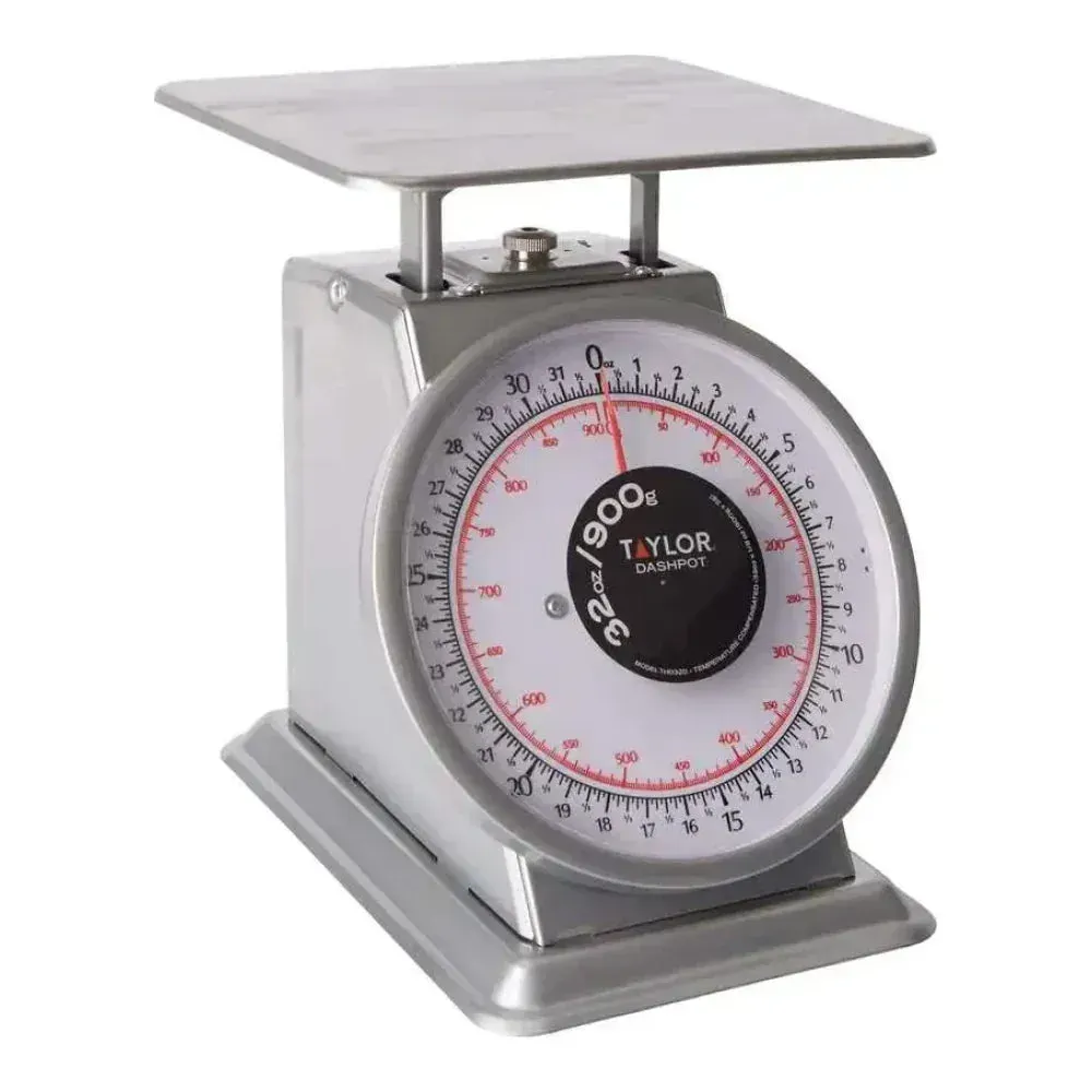Taylor mechanical portion scale with dashpot, built for smooth, accurate weighing and reduced dial bounce in foodservice environments.