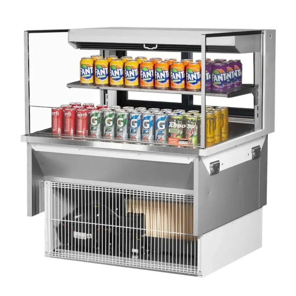 Low profile horizontal open merchandiser by Turbo Air with a compact width, single shelf, LED lighting, and a small front vent grille.