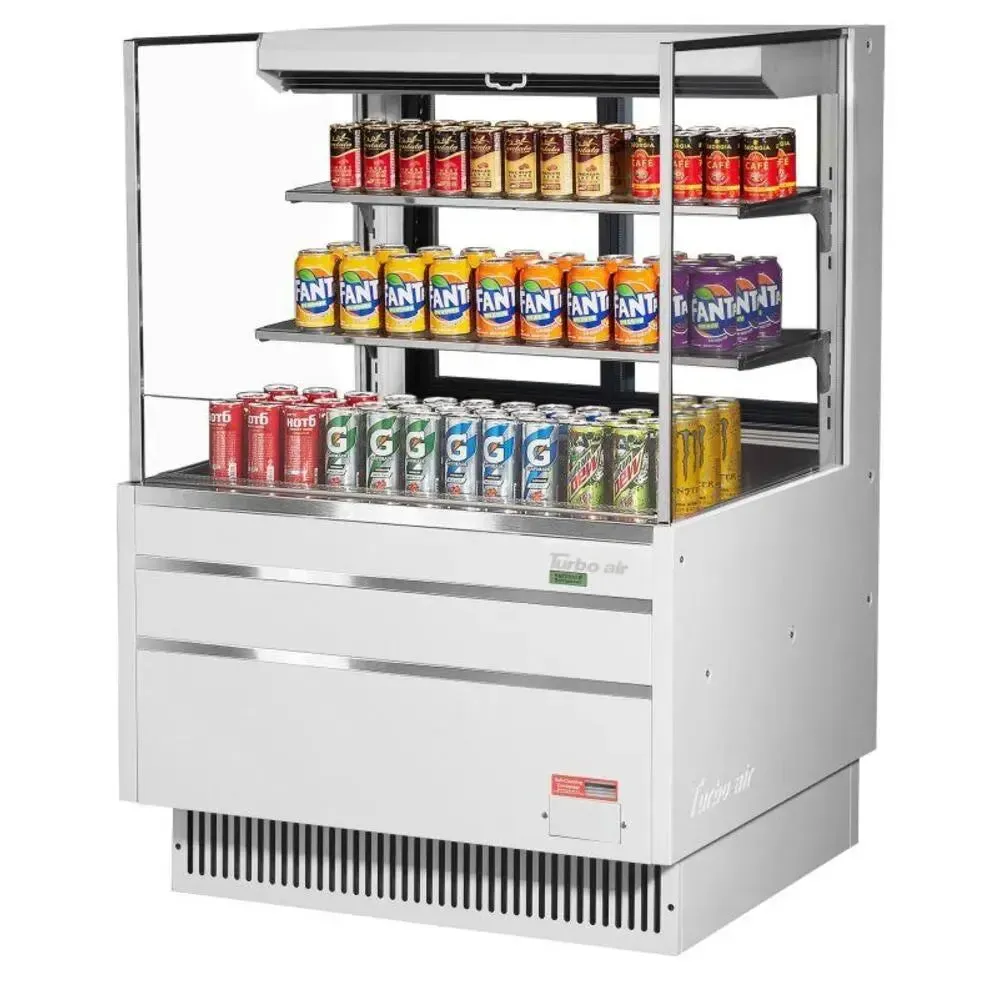 Low profile horizontal open merchandiser from Turbo Air with a compact width, dual shelf, LED lighting, and a night curtain housing.