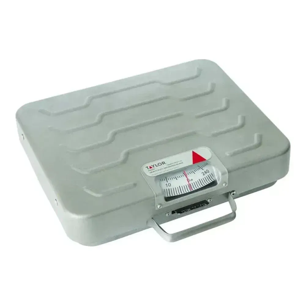 Taylor heavy-duty mechanical receiving scale with durable finish, ideal for weighing bulk ingredients and crates in commercial food operations.