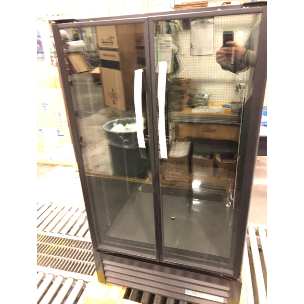 Used True TVM-30-HC~VM01 30 7/8" Black Refrigerated Glass Door Merchandiser, 3-Year Limited Warranty