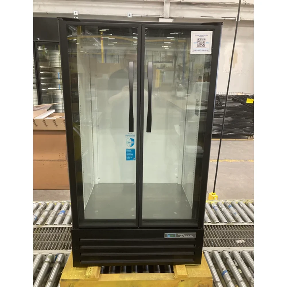 Used True TVM-30-HC~VM03 30 7/8" TVM Series Glass Door Merchandiser, 2 Doors, Black, 3-Year Limited Warranty