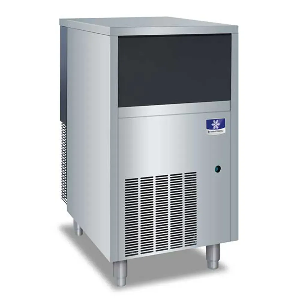Manitowoc undercounter flake ice machine with fifty-pound bin, perfect for cafés and hotel kitchens, ensuring steady daily flake ice in small spaces.