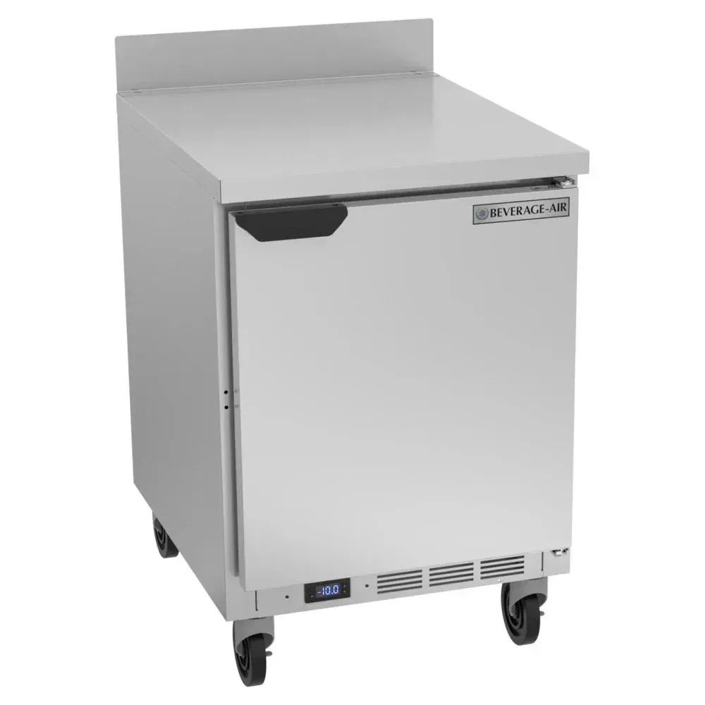 Single-door freezer combines prep space and frozen storage in one; Beverage-Air stainless construction suits small cafes or hotel kitchens.