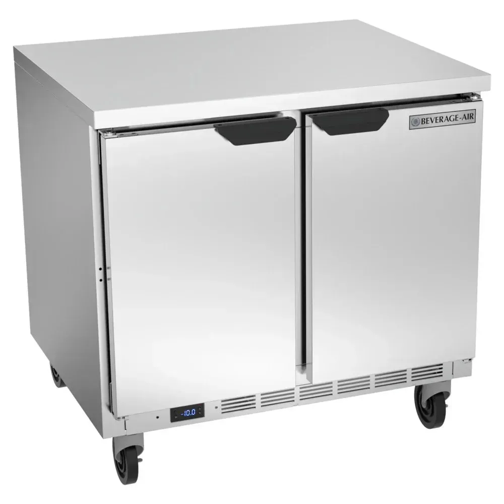 Flat-top worktop freezer adds prep space while keeping items frozen; Beverage-Air stainless unit fits smaller cafes with tight kitchen layouts.